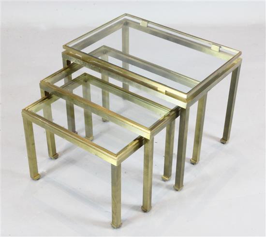 Guy Lefevre for Maison Jansen. A nest of brushed gilt metal tables, 1ft 8in. x 1ft 2in. H.1ft 3in.
